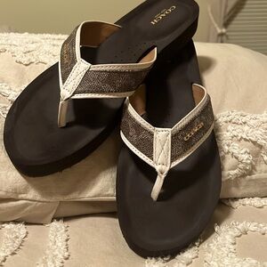 Coach flip flop sandal.  Brown size 10.